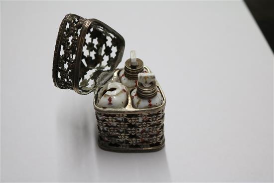 A late Victorian silver aide memoire (ex chatelaine), a childs rattle and white metal scent casket.